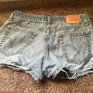 Low waisted levi shorts , slightly worn